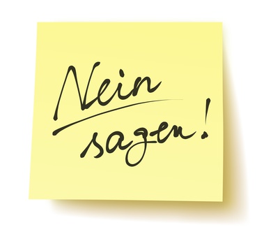 Gelber Notizzettel mit der Aufschrift „Nein sagen!“